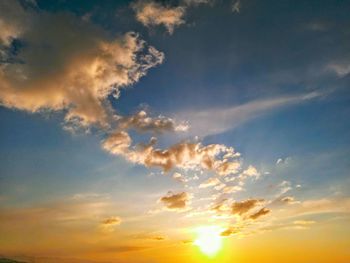 Low angle view of cloudy sky during sunset