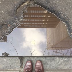 Low section of person standing on ground