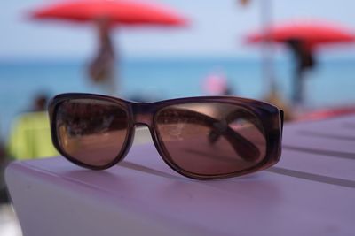 Close-up of sunglasses on table