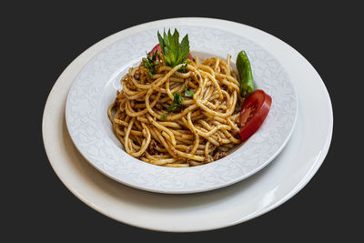 Close-up of noodles served in plate