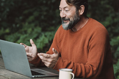 Young man using laptop