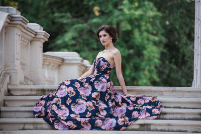 Portrait of young woman outdoors