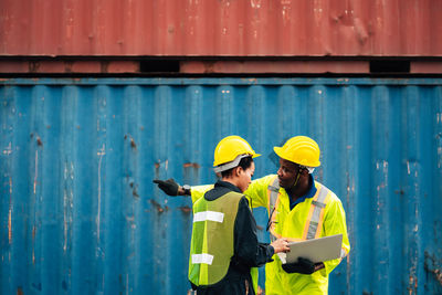 Men working in traditional clothing