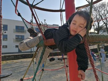 Portrait of child hanging in the air