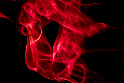 Close-up of light painting against black background