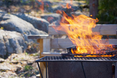 Close-up of fire on barbecue grill
