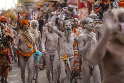 Statues in market stall in city