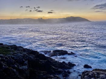 Scenic view of sea against sky during sunset