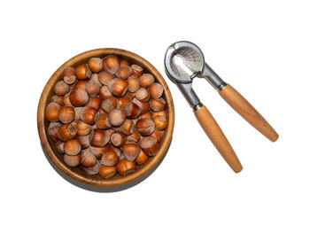 High angle view of bread in container against white background