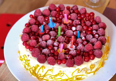 High angle view of strawberries in plate
