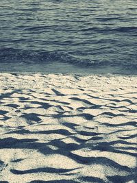 High angle view of sand on beach