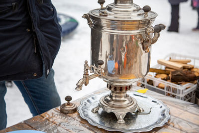 Russian teapot samovar on maslenitsa outdoor selebration