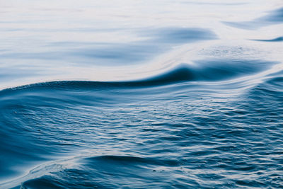 Scenic view of sea against blue sky