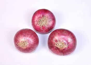 Close-up of apple against white background