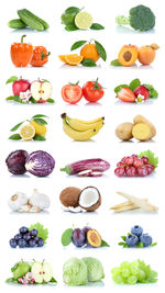 Fruits and vegetables on white background