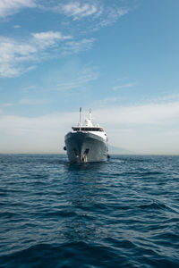 Ship in sea against sky