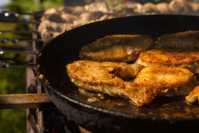 Close-up of meat in container