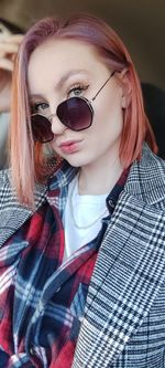 Portrait of woman wearing sunglasses