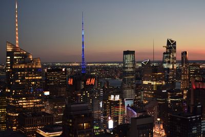 Illuminated buildings in city at night