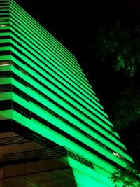 Low angle view of illuminated lights at night