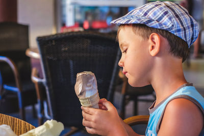 Portrait of boy holding ice cream