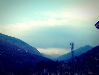 Low angle view of mountains against sky during sunset