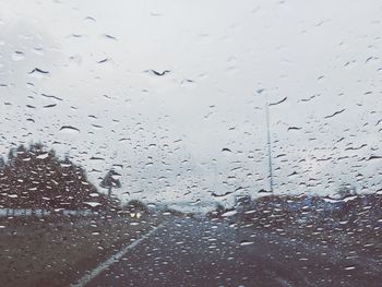 Full frame shot of wet window in rainy season