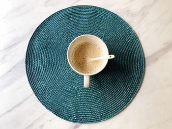 High angle view of coffee cup on table