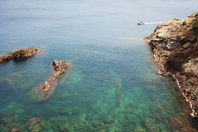 High angle view of rocks on beach