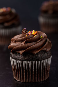 Close-up of cupcakes on table