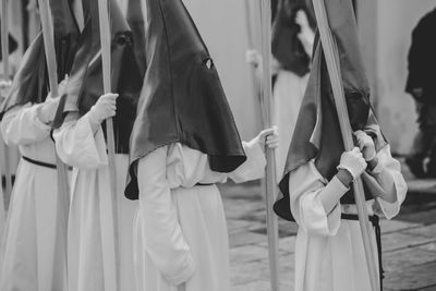 Group of people in row at parade