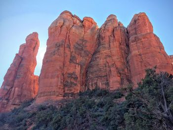 Low angle view of cathedral rocks against sky