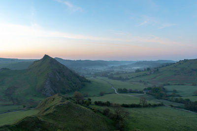 Scenic view of landscape against sky during sunset