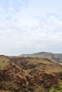 View of landscape against cloudy sky