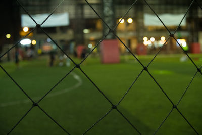 View of soccer field seen through net