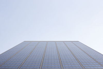 Low angle view of modern building against clear sky