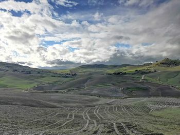 Scenic view of field against sky