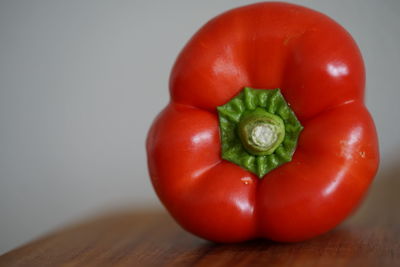 Close-up of red bell peppers on table
