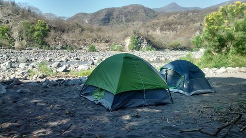 Camping tents on shore