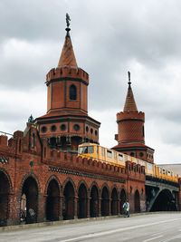 Low angle view of cathedral against cloudy sky