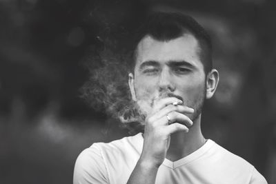 Portrait of man smoking