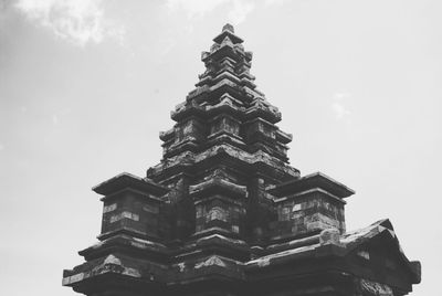 Low angle view of temple against building