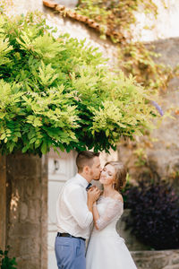 Young couple standing in park