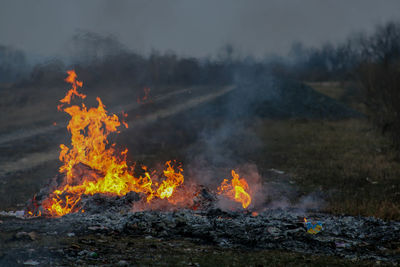 View of bonfire against mountain