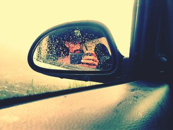 Reflection of car on glass window