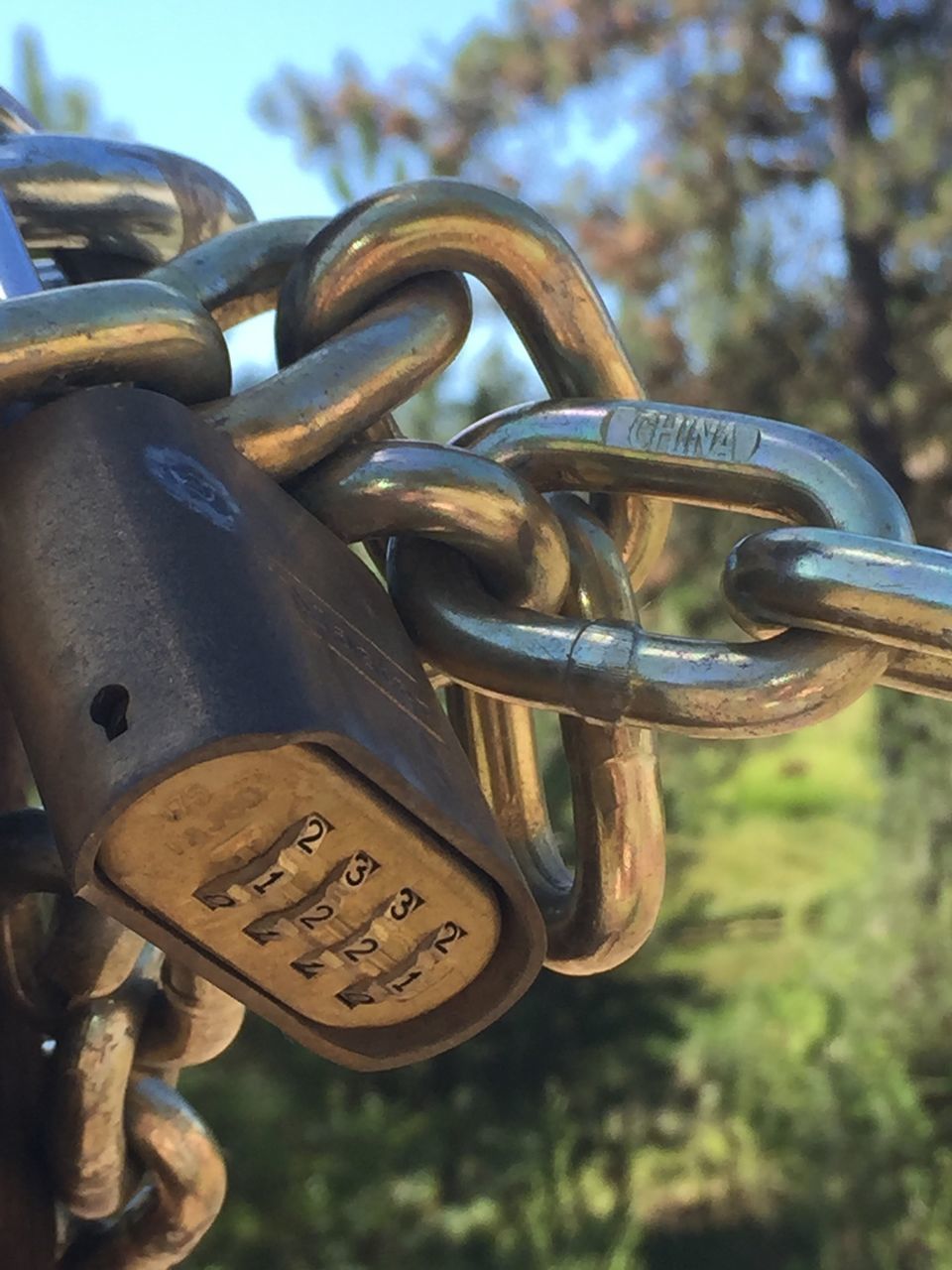 metal, text, close-up, communication, focus on foreground, western script, safety, rusty, metallic, security, number, chain, padlock, old, lock, protection, day, connection, strength, no people