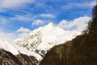 Snowy mountains landscape in gudauri, georgia. sunny day.