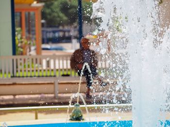 Man splashing water