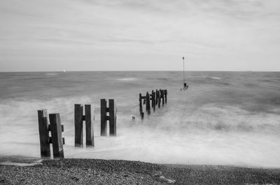 View of calm beach against the sky