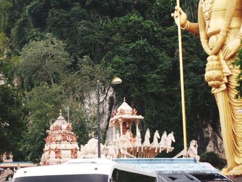 Panoramic view of statue by temple